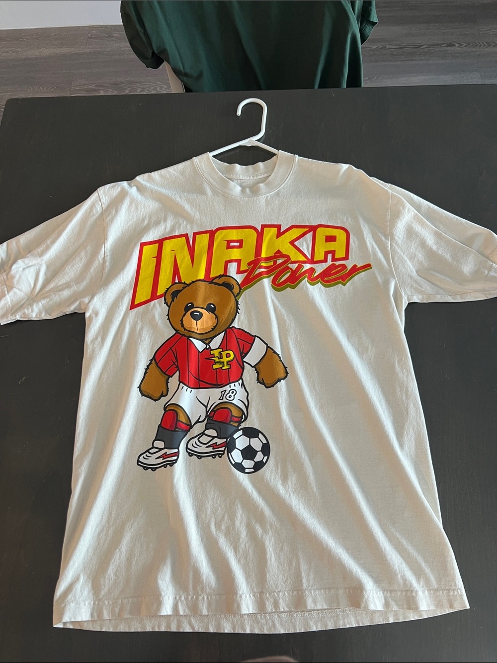 Inaka Power White Kids' Tee with Red & Yellow Teddy Soccer Graphic